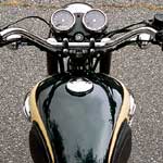 The W650 gets a wider bar than the Bonneville and a most welcome and aesthetically appropriate tachometer. 